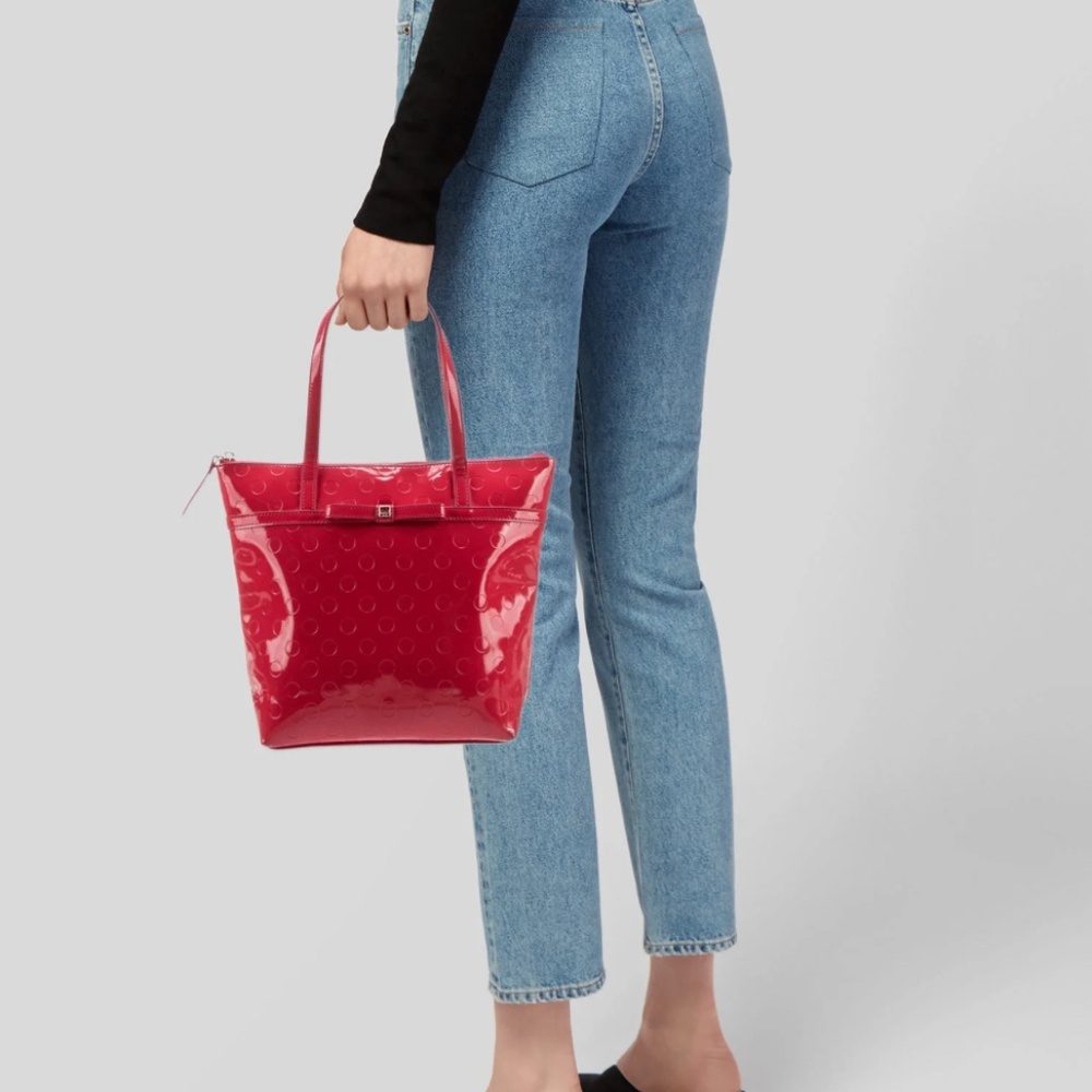Amazing, shiny, and very red. Kate Spade's small tote is almost new!!!!!